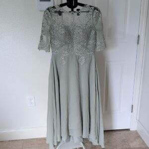 Green High Low Gown with Bell Sleeves and Scoop Neck